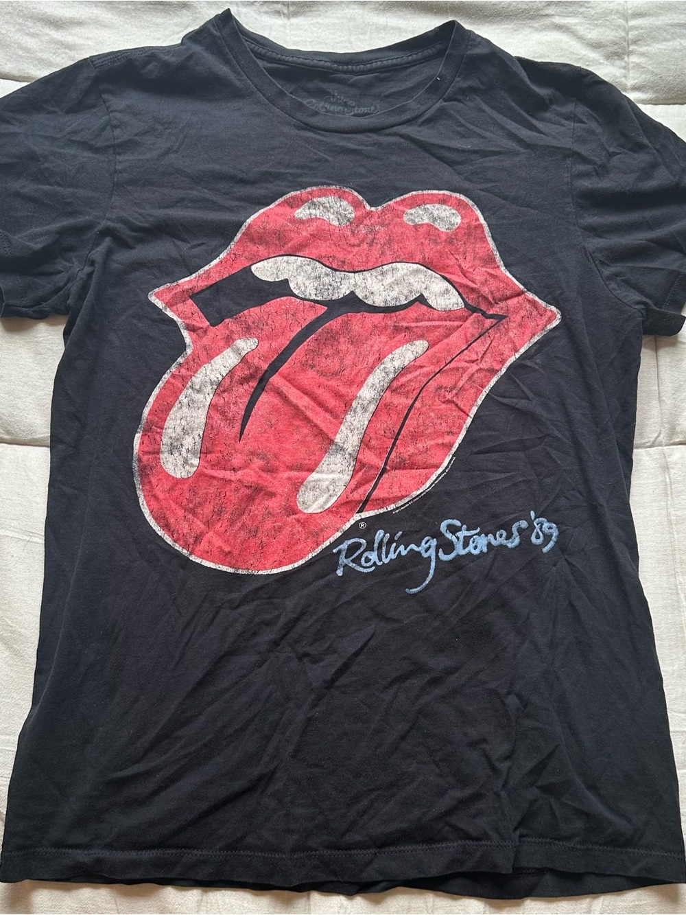 the Rolling Stones Black T‑Shirt with Red Tongue Graphic